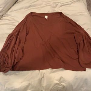 Rust colored, dolman sleeved shirt